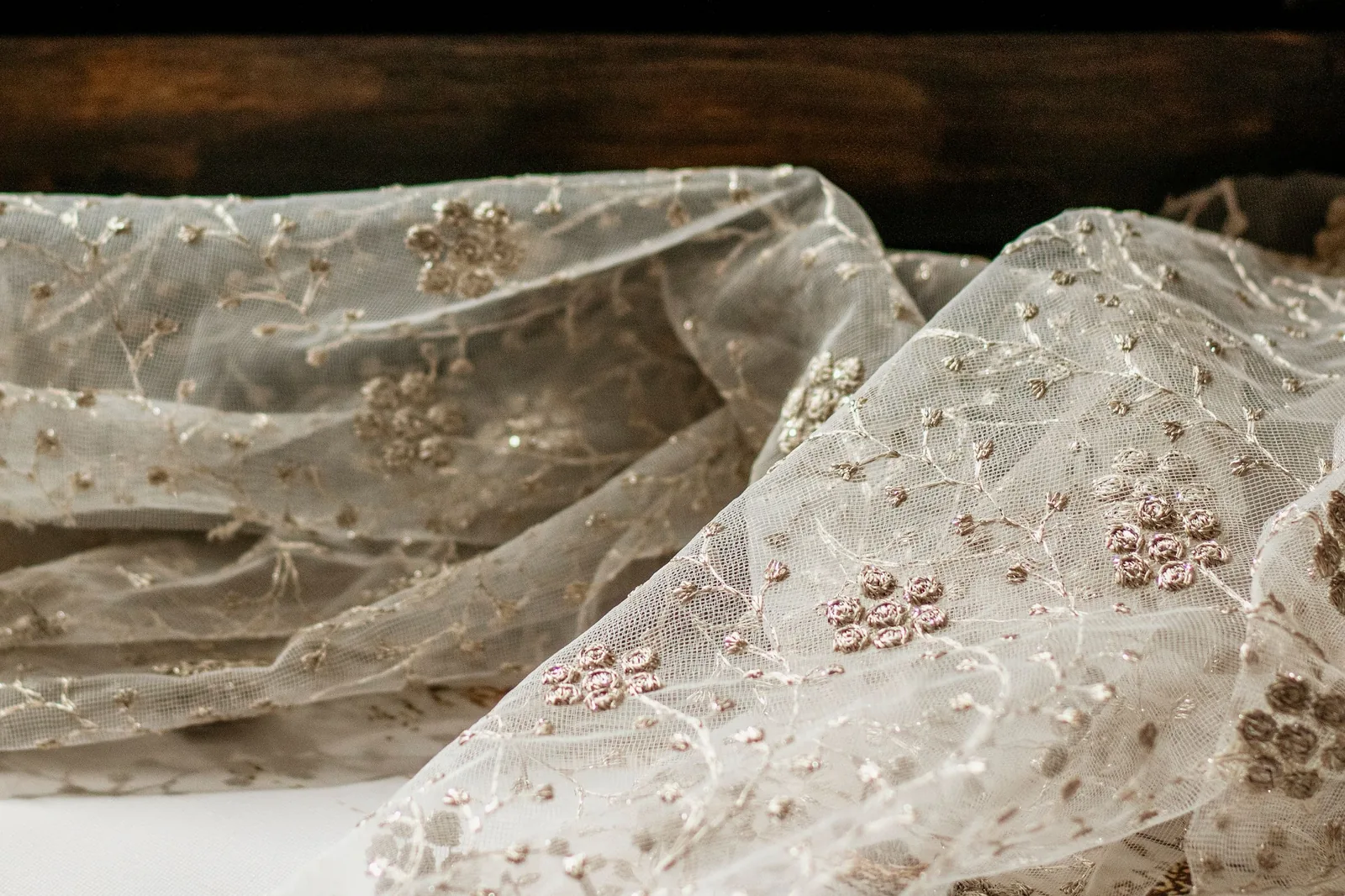 Floral embroidery on sheer tulle